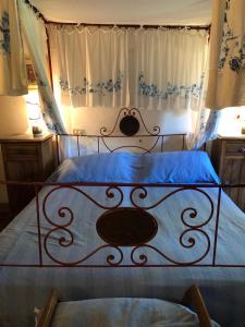 Posteľ alebo postele v izbe v ubytovaní Antica casa colonica in pietra in Toscana