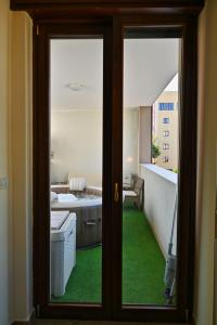 Katil atau katil-katil dalam bilik di Holiday Home La Fenice