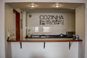 a kitchen with a counter top in a room at Cora 96 Street Apartments in Bogotá