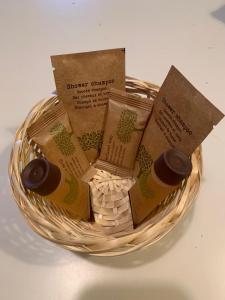 a basket filled with books and cards in it at Maison Sferisterio in Macerata +2 photos