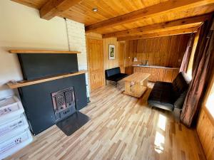 Χώρος καθιστικού στο Forest house Einblūti +10 φωτογραφίες