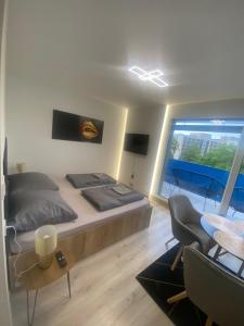 Posedenie v ubytovaní Lake View Penthouse