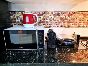 Posezení v ubytování Prestige Apartment Oued Laou + 21 fotografií