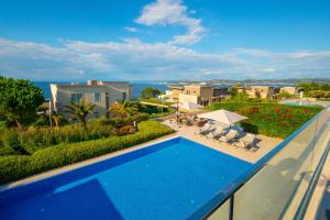 a swimming pool on the roof of a house at Celine in Savudrija