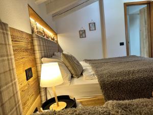 Llit o llits en una habitació de Si Mezzana Home