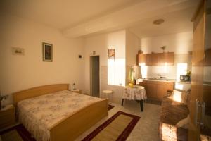 Postel nebo postele na pokoji v ubytování "Azzurra Apartments