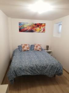 Postel nebo postele na pokoji v ubytování Appartement avec terrasse entre vignes, balades, Alsace