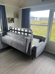 Postel nebo postele na pokoji v ubytování Sun-cottage South Iceland