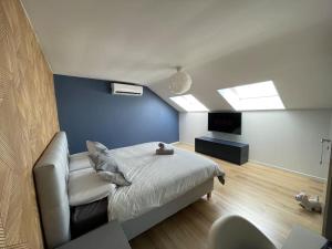 Postel nebo postele na pokoji v ubytování Duplex 100m2 style contemporain