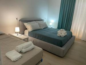Posteľ alebo postele v izbe v ubytovaní Guest House Civico 513 Casa Vacanze Reggio Calabria