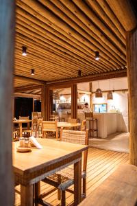 Restorāns vai citas vietas, kur ieturēt maltīti, naktsmītnē Pousada Nossa Casa Cumuruxatiba
