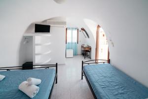 Uma cama ou camas num quarto em Villa Dima