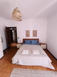 Posteľ alebo postele v izbe v ubytovaní Apartment Al Lago, Torri del Benaco