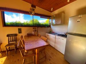 Eldhús eða eldhúskrókur á Cabañas SPA Olmue