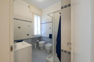 Ванная комната в TulipHouse da Davide +21 фотография