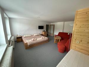 Postel nebo postele na pokoji v ubytování Hotýlek u Kance + 29 fotografií