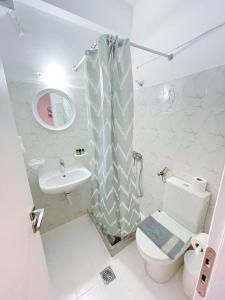 Uma casa de banho em Villa Dima