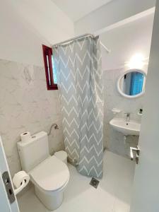 Uma casa de banho em Villa Dima