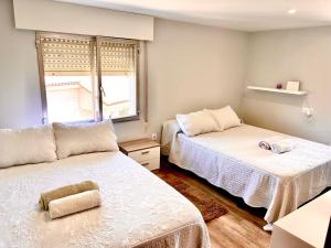 A bed or beds in a room at Mirador Puerto