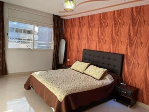 Postel nebo postele na pokoji v ubytování Shrif Appart-Luxe + 6 fotografií