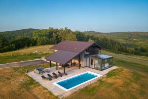 an overhead view of a house with a pool at Villa Trn in Cetingrad