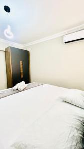 Postel nebo postele na pokoji v ubytování Apartment in central trabzon with free Wi-Fi