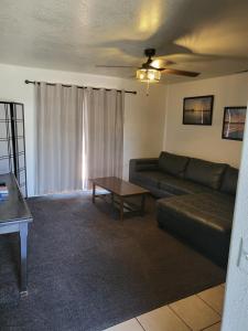 a living room with a couch and a coffee table at Tail Wind Life LLC in Page