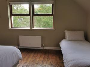 Letto o letti in una camera di Blue Stack View