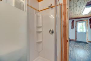 a room with a shower with a glass door at Norfork Studio by White River Ideal for Fishing! in Norfork