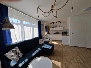 Kuchyňa alebo kuchynka v ubytovaní Przystań Hel Apartament