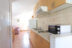Kuchyň nebo kuchyňský kout v ubytování Apartment Baska Voda 300c