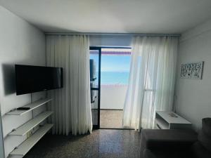 TV a/nebo společenská místnost v ubytování Vista espetacular 4 pessoas Praia de Iracema