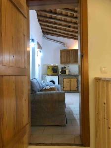 a view of a living room with a couch at Casa Tranquila Barrada in Alcoutim