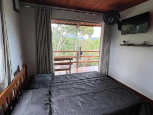 Postel nebo postele na pokoji v ubytování Casa.dovale2