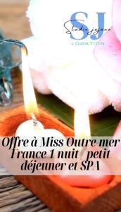 an image of a candle with a message on it at Charmant logement avec spa/petit-déjeuner inclus. in Pointe-Noire