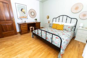 Villa Ninetta tesisinde bir odada yatak veya yataklar