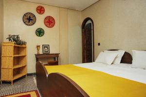 Postel nebo postele na pokoji v ubytování Auberge RIAD DLIM Tamraght