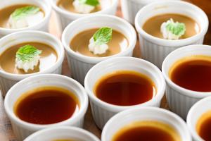 a group of cups filled with tea and mint leaves at Hotel Sobial Namba Daikokucho in Osaka +99 photos