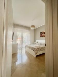 En eller flere senge i et værelse på casalucefalu