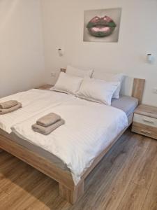 Postel nebo postele na pokoji v ubytování Ivaana