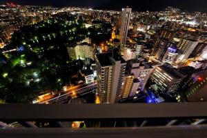 a view of a city at night at Meteor Shower in Sapporo