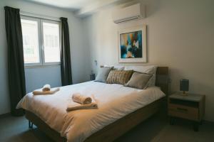 Postel nebo postele na pokoji v ubytování 86 Spinola Bay