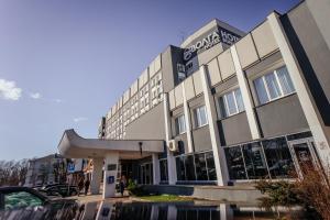una representación de la parte delantera de un hotel en Hotel Volga, en Tver