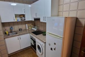 Virtuve vai virtuves zona naktsmītnē Apartamento Km. 0 - Centro Puro de Oviedo para 2/4 pax
