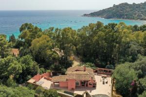 an aerial view of a house next to the ocean at Villa La Petite Etoile in Torre delle Stelle