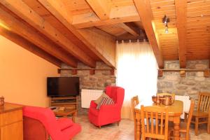 Μια τηλεόραση ή/και κέντρο ψυχαγωγίας στο Apartamentos Clavería