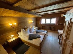 an overhead view of a bedroom with two beds at Chalet Nina in Reith im Alpbachtal