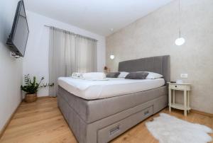 Postel nebo postele na pokoji v ubytování Apartment Mirjana