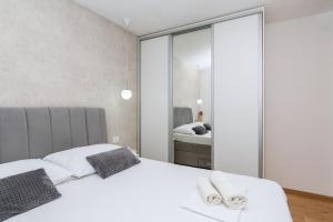 Postel nebo postele na pokoji v ubytování Apartment Mirjana