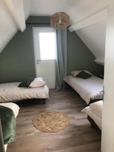 Postel nebo postele na pokoji v ubytování Gîte 2 chambres
